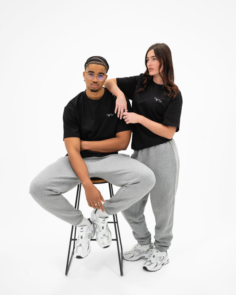 Race & Taylor 12 Rounds Heavy T-Shirt — male and female models front view, full body studio shot
