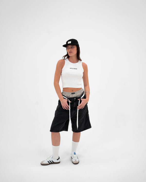 R&T Cropped Racer Vest White — front full body shot on female model, studio
